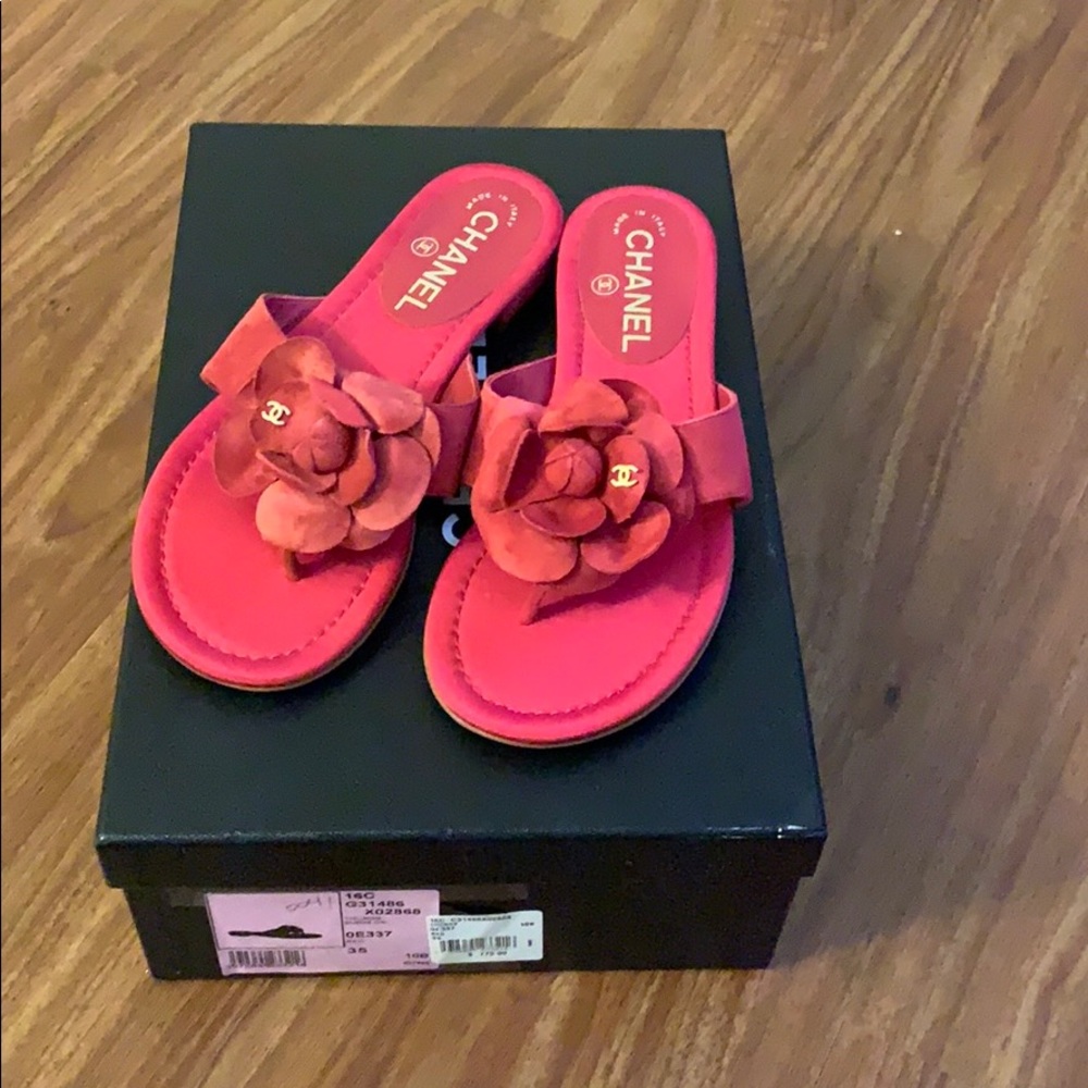 Pink suede thongs sandals.